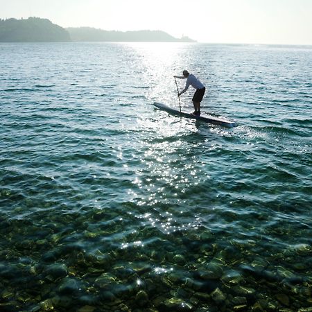 Hotel Slovenija - Terme & Wellness Lifeclass ปอร์โตรอซ ภายนอก รูปภาพ Stand-up paddle boarder on Lake Balaton